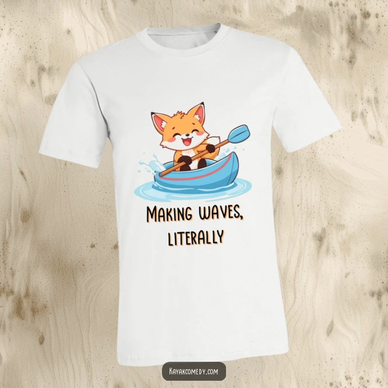 Funny T-Shirt: A gleeful fox cub splashes water from a blue kayak, radiating energetic fun. Perfect gift.