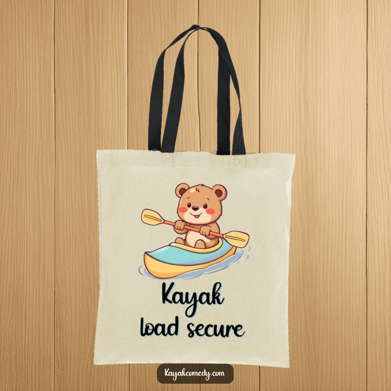 Funny Tote Bag: An enthusiastic bear cub happily kayaks, a charming image of pure outdoor joy. Perfect gift.